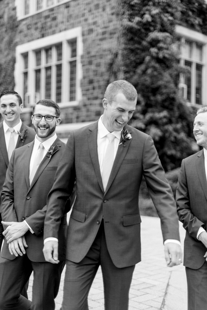 Groom and groomsmen candid portraits at Wedding at Lehigh University and Lehigh Country Club by Fine Art Photographer Michelle Behre Photography