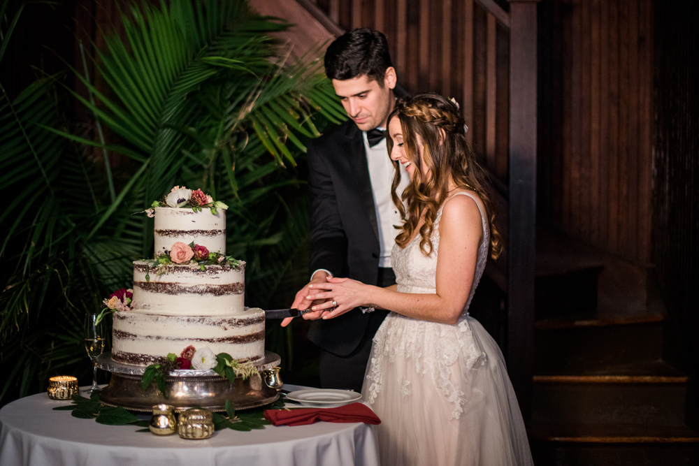 cake cutting, photographed by New Jersey fine art hybrid photographer, Michelle Behre Photography, private fall wedding at Water Witch Club, Falco's Catering, Highlands, New Jersey.