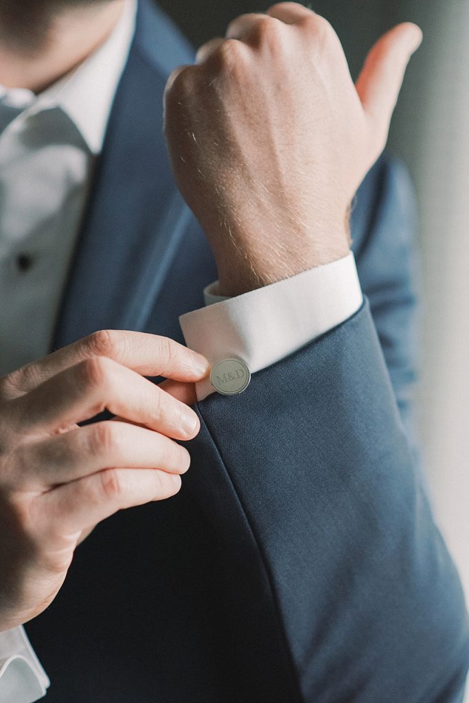Silver groom cufflinks for a RiverCrest Golf Club wedding by wedding photographer Michelle Behre Photography.