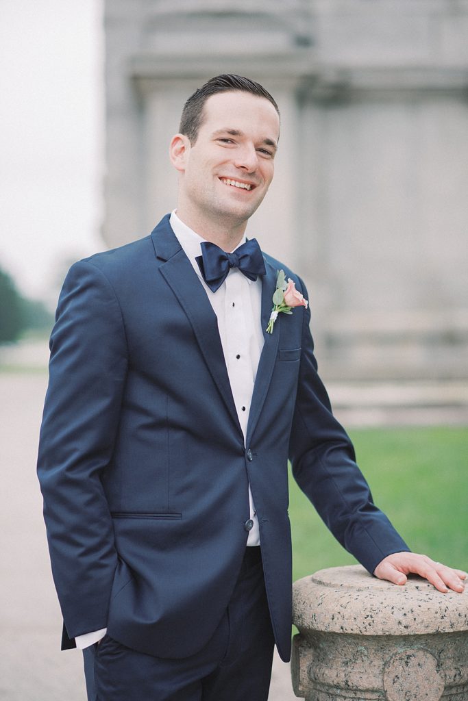 An elegant summer wedding with groom portraits at Valley Forge National Park and RiverCrest Golf and Country Club.