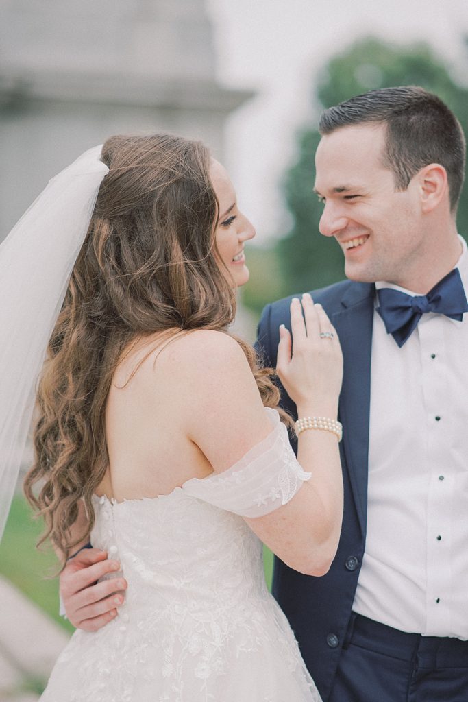 An elegant summer wedding with bride and groom at Valley Forge National Park by wedding photographers Michelle Behre Photography.