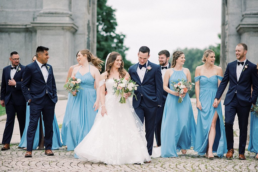 An elegant summer wedding with wedding party portraits at Valley Forge National Park by wedding photographers Michelle Behre Photography.