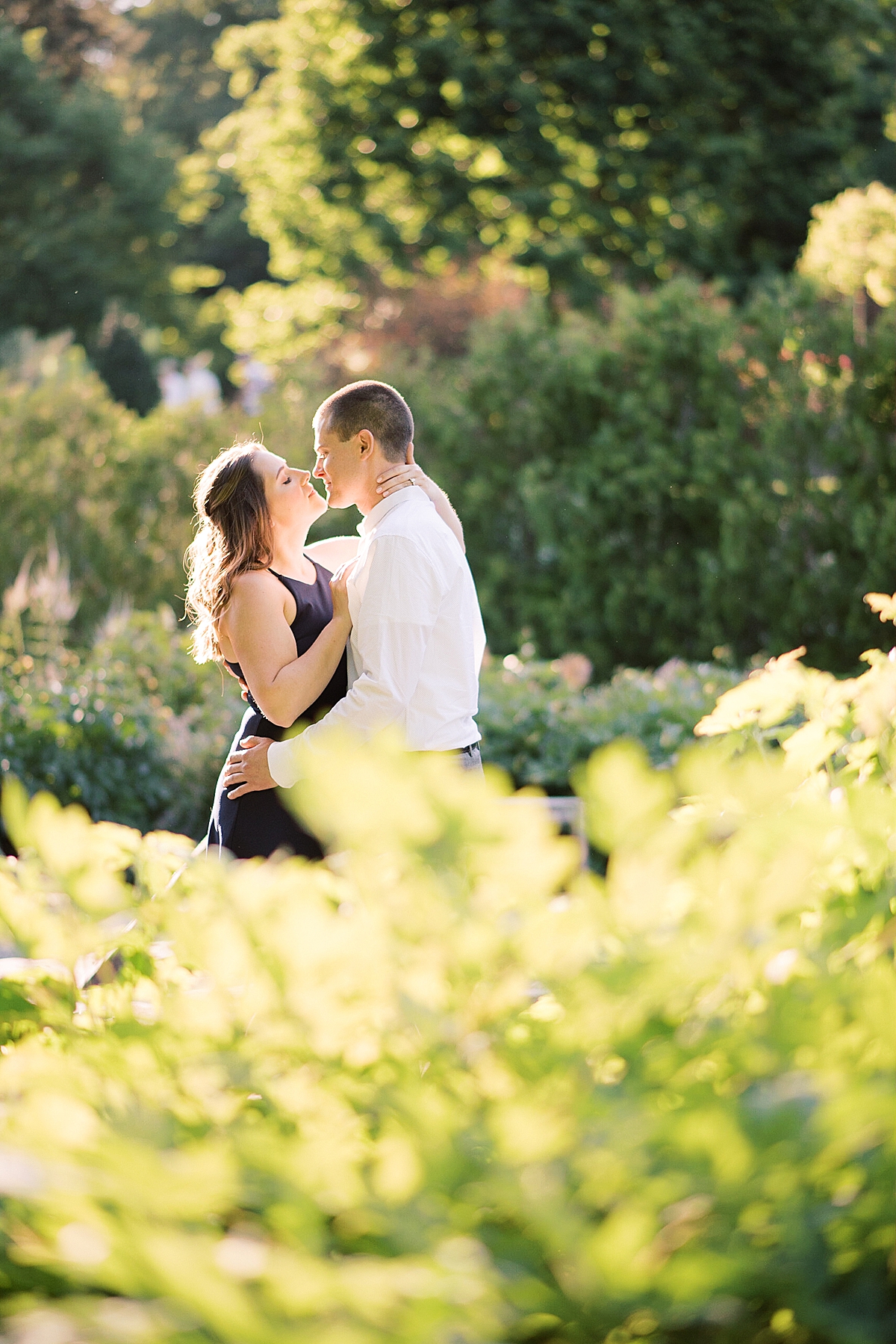 Gorgeous summer sunset engagement session at the romantic Longwood Gardens in Kennett Square outside of Philadelphia, Pennsylvania by engagement photographers Michelle Behre Photography.
