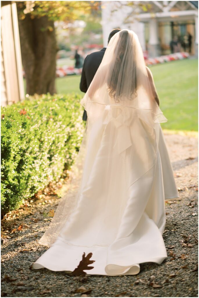 post ceremony moment at golden hour captured at the crossed keys estate by nj wedding photographers Michelle Behre Photography